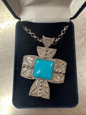 Montana Silversmith’s Silver-Tone Cross Necklace with Turquoise Center